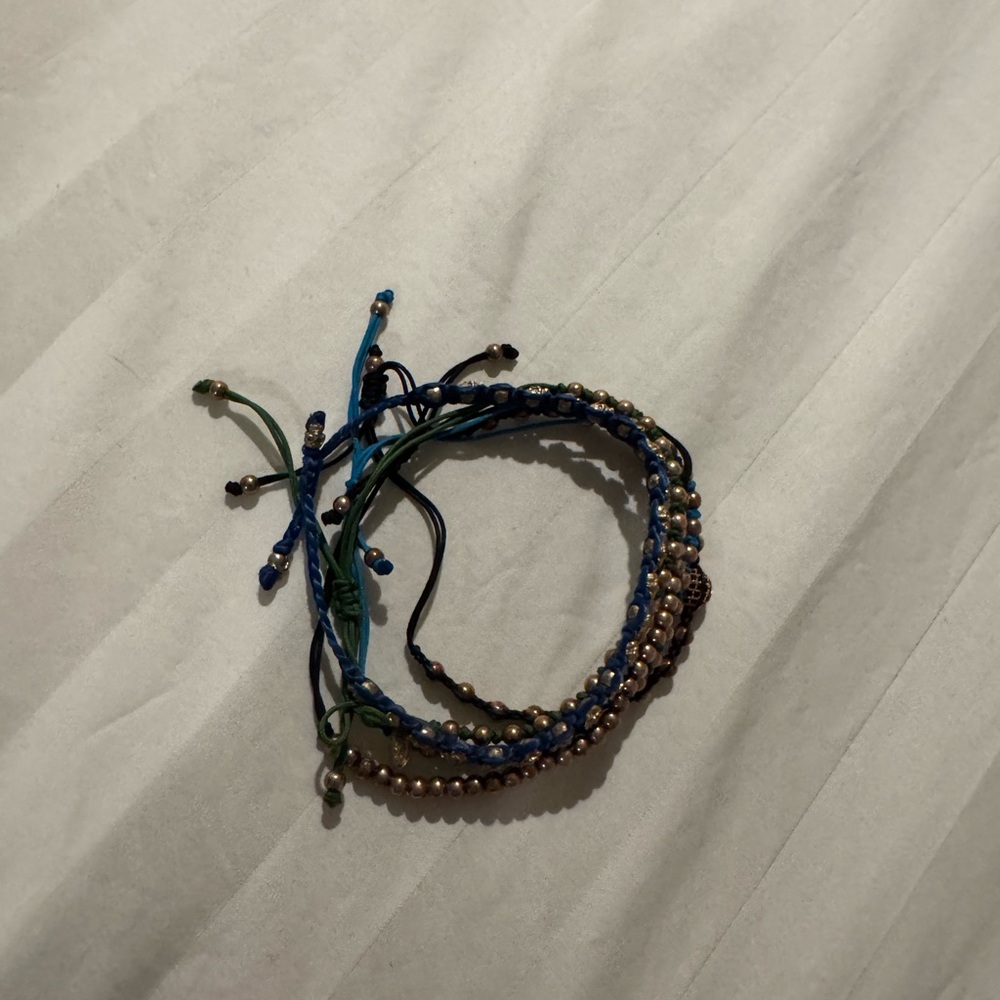 Set of adjustable string bracelets